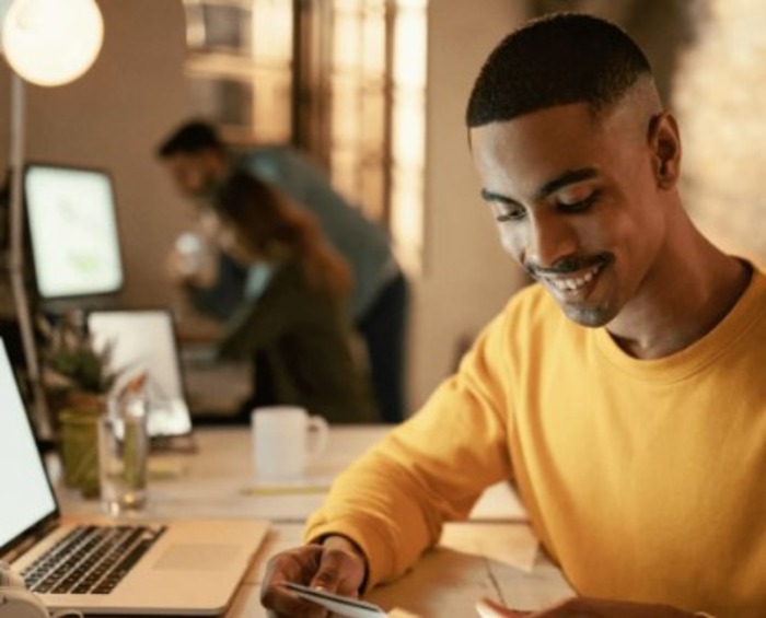 SMS Banking: 3 Benefits for Secure Mobile Banking Transactions | Message Whiz Man using SMS for secure Banking